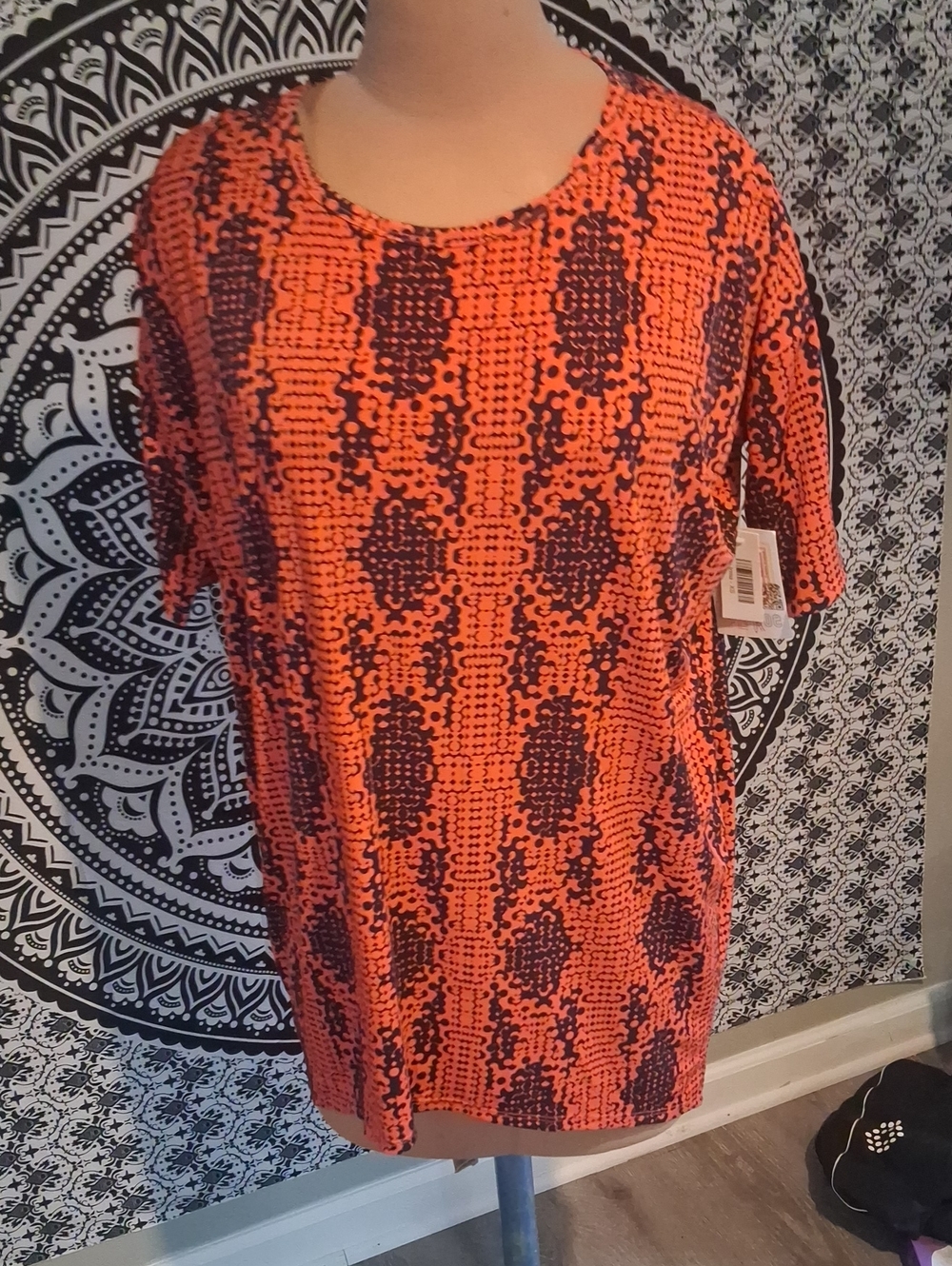 LuLaRoe Bright Orange Short Sleeve Tee with Navy Abstract Print